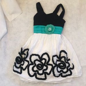 Beautiful black and white dress with teal accents